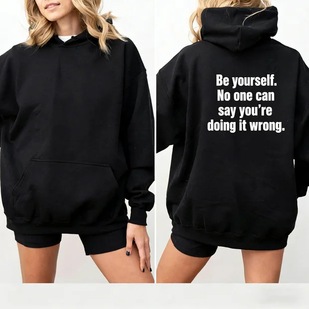Fun hooded sweatshirt with slogan "Be yourself. No one can say you're doing it wrong"