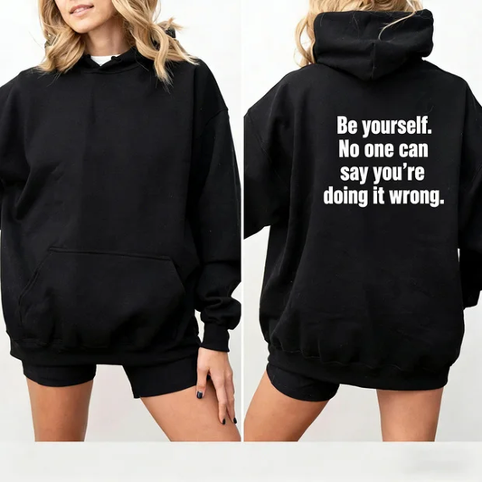 Fun hooded sweatshirt with slogan "Be yourself. No one can say you're doing it wrong"