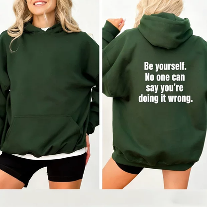 Fun hooded sweatshirt with slogan "Be yourself. No one can say you're doing it wrong"